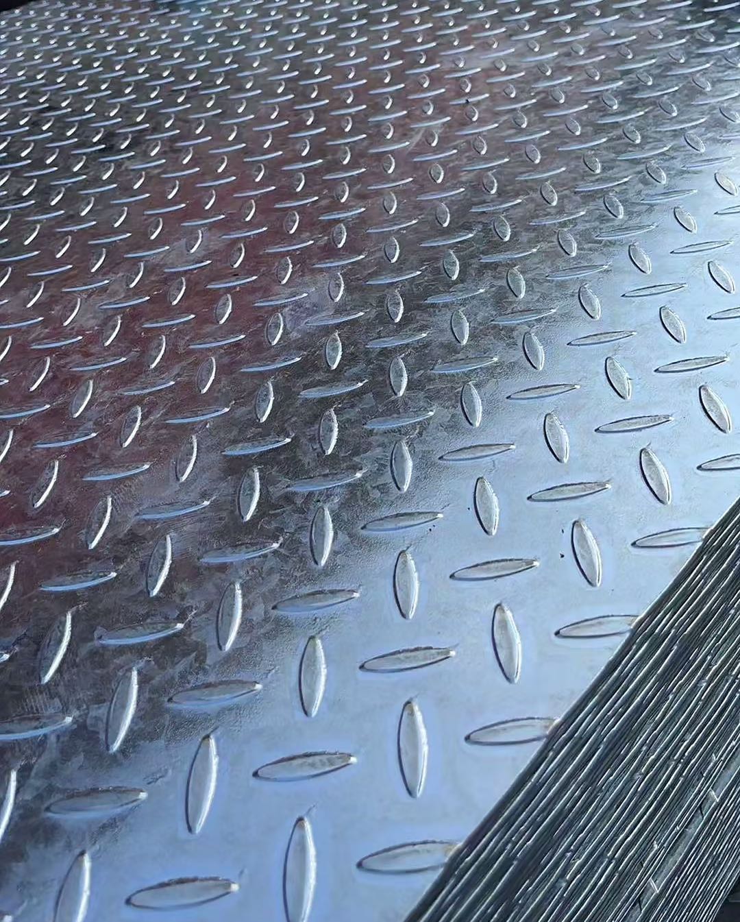 Galvanised checker plate 3mm, 2400 x 1200mm sheet – close-up of raised lentil pattern